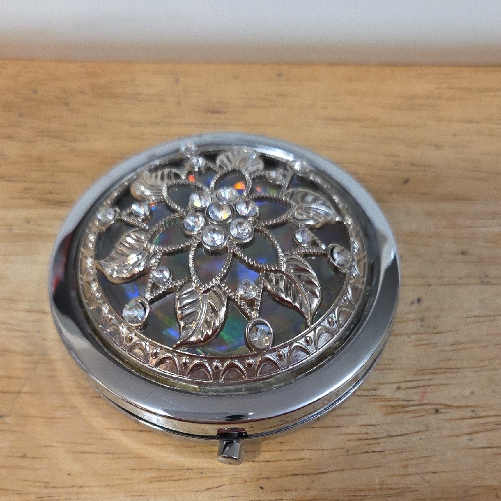 Elegant Silver Compact Mirror